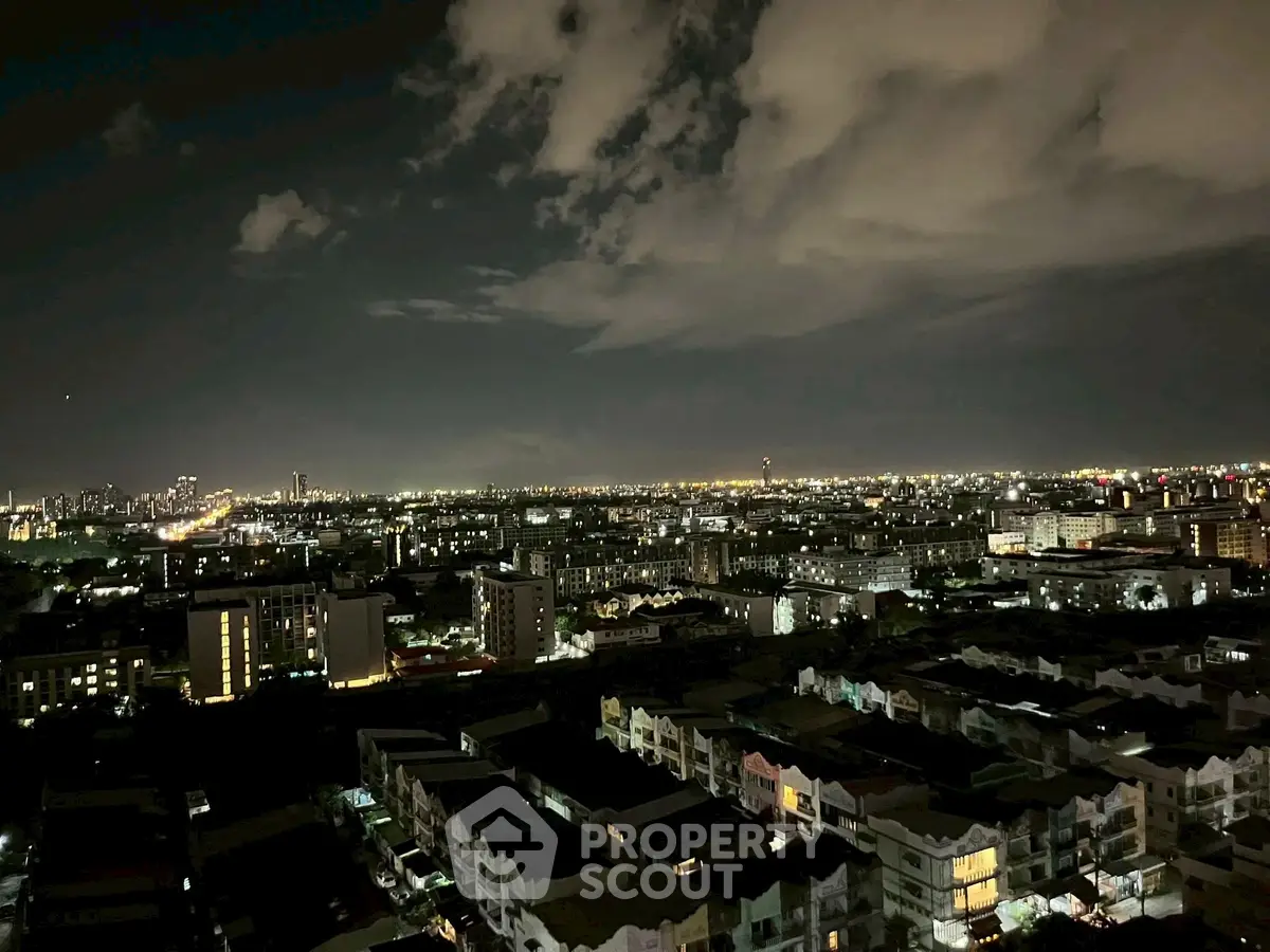 Stunning nighttime cityscape view from high-rise building balcony