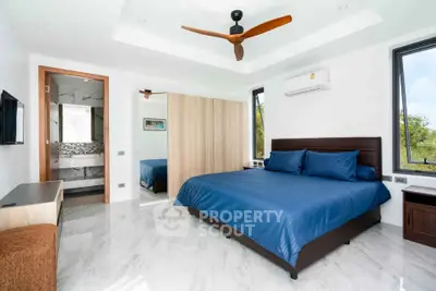 Luxurious modern bedroom with king-size bed and elegant decor