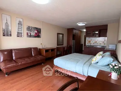 Spacious studio apartment with modern decor and cozy furnishings