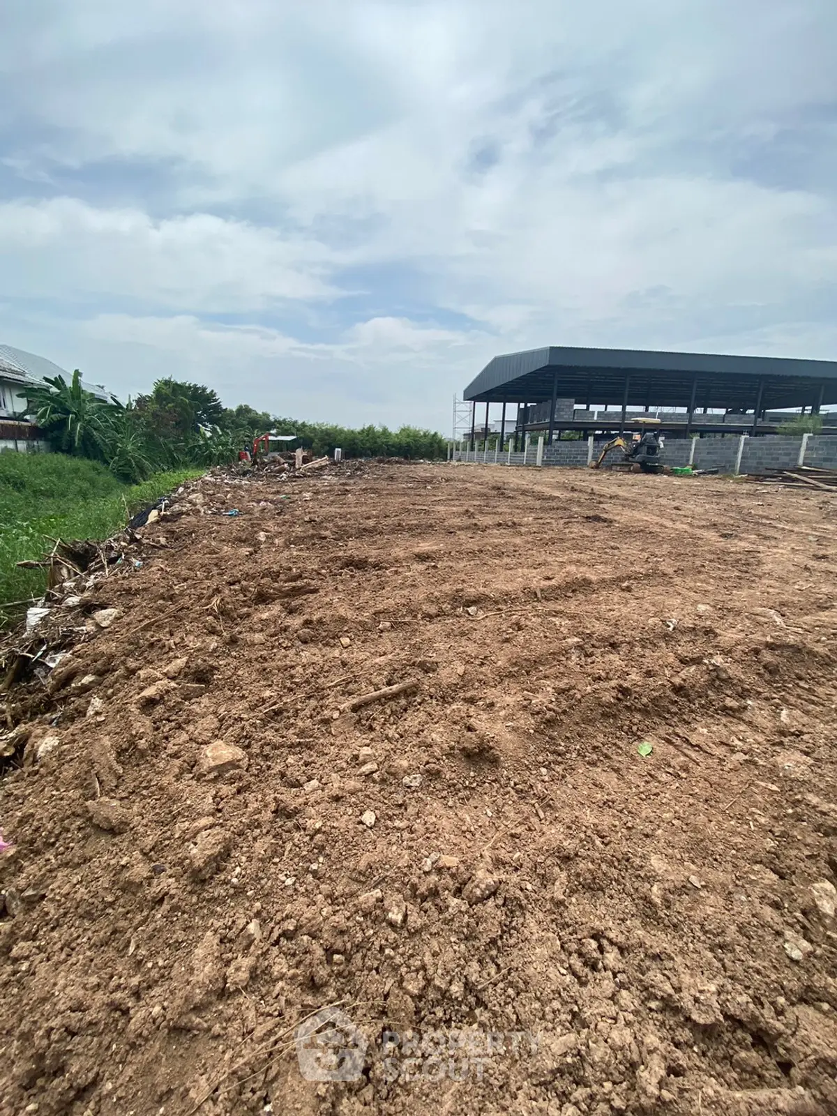 Expansive land plot with development potential and scenic surroundings