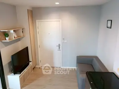 Modern living room with sleek design and cozy furniture