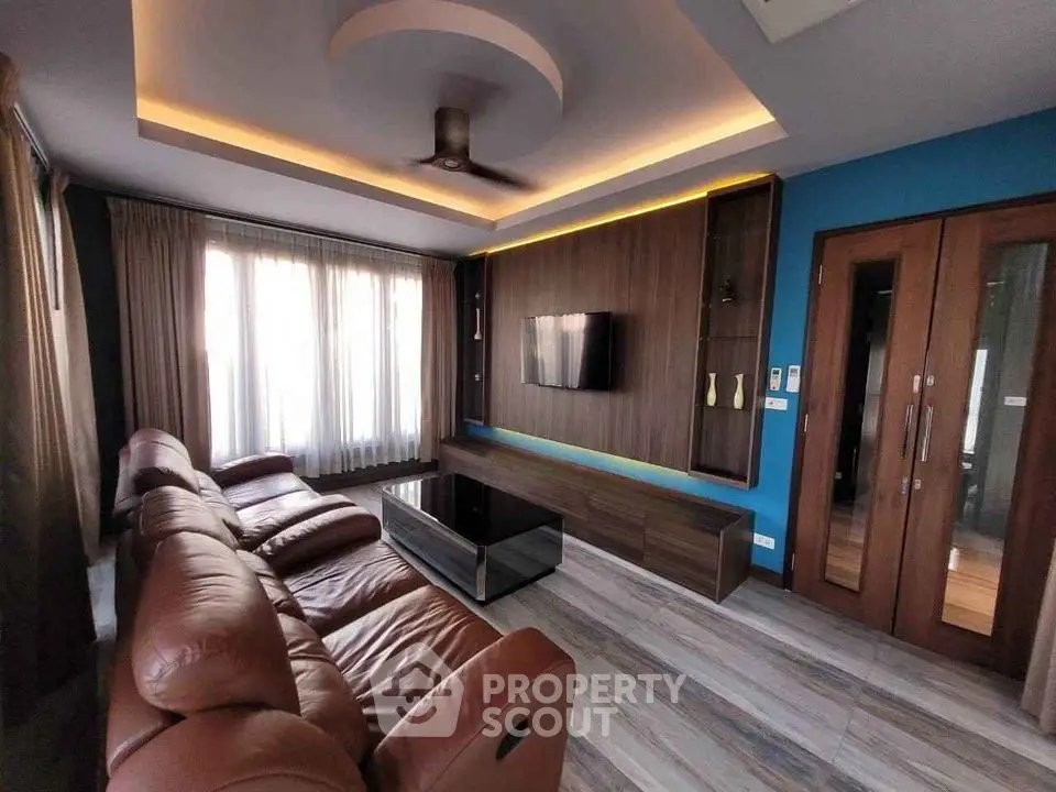 Luxurious modern living room with leather sofa and stylish decor