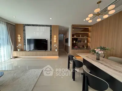 Luxurious modern living room with elegant dining area and stylish decor