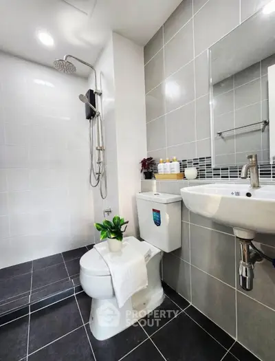 Modern bathroom with sleek fixtures and stylish tile design