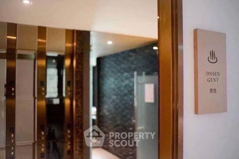Luxurious spa entrance with elegant design and signage for a relaxing experience.