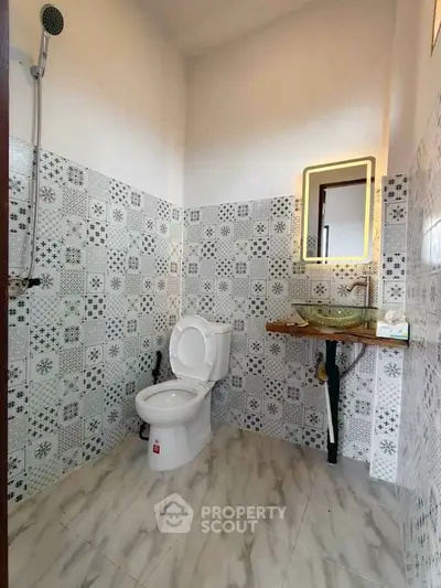 Modern bathroom with stylish tiles and elegant fixtures