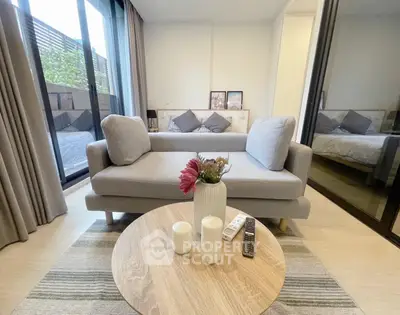 Modern living room with cozy sofa and stylish decor in a bright apartment