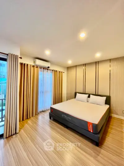 Spacious modern bedroom with elegant design and natural light