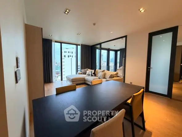 Modern living room with city view and stylish furniture