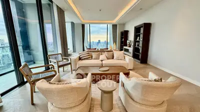 Luxurious modern living room with panoramic city view and elegant furnishings.