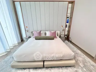 Luxurious modern bedroom with elegant decor and plush bedding