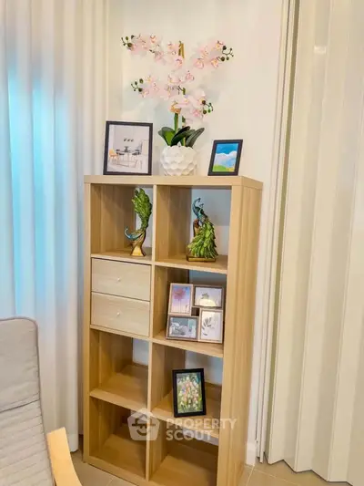 Stylish living room corner with modern shelving and decor accents