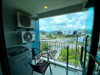 Charming balcony with city view, perfect for relaxation and enjoying the skyline.