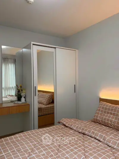 Cozy bedroom with modern wardrobe and stylish decor