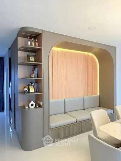 Modern interior with built-in seating and stylish shelving in a cozy living space.