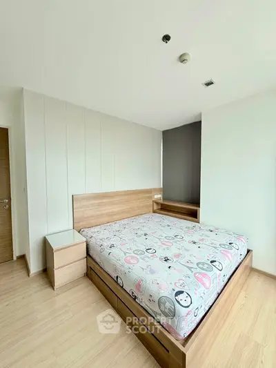 Spacious bedroom with modern wooden furniture and stylish decor