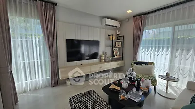 Spacious modern living room with large windows and stylish decor