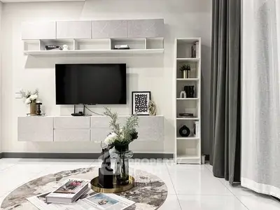Modern living room with sleek TV unit and stylish decor