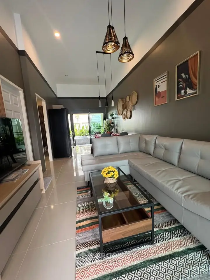 Stylish modern living room with elegant decor and spacious seating area, perfect for relaxation and entertainment.