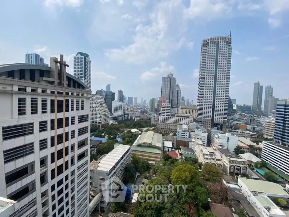 Stunning cityscape view showcasing modern skyscrapers and lush greenery, perfect for urban living enthusiasts.