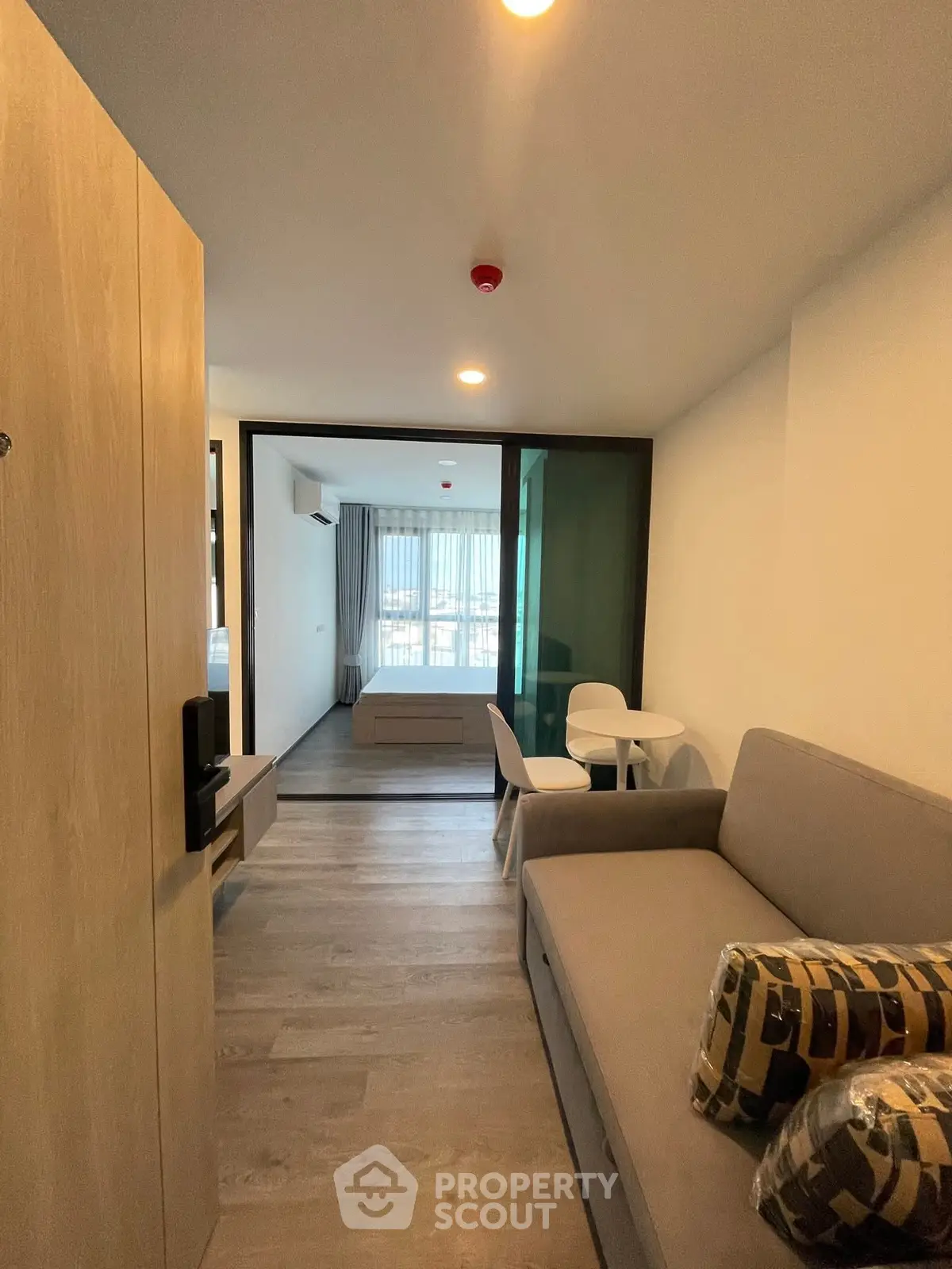 Modern living room with stylish furniture and open layout, perfect for urban living.