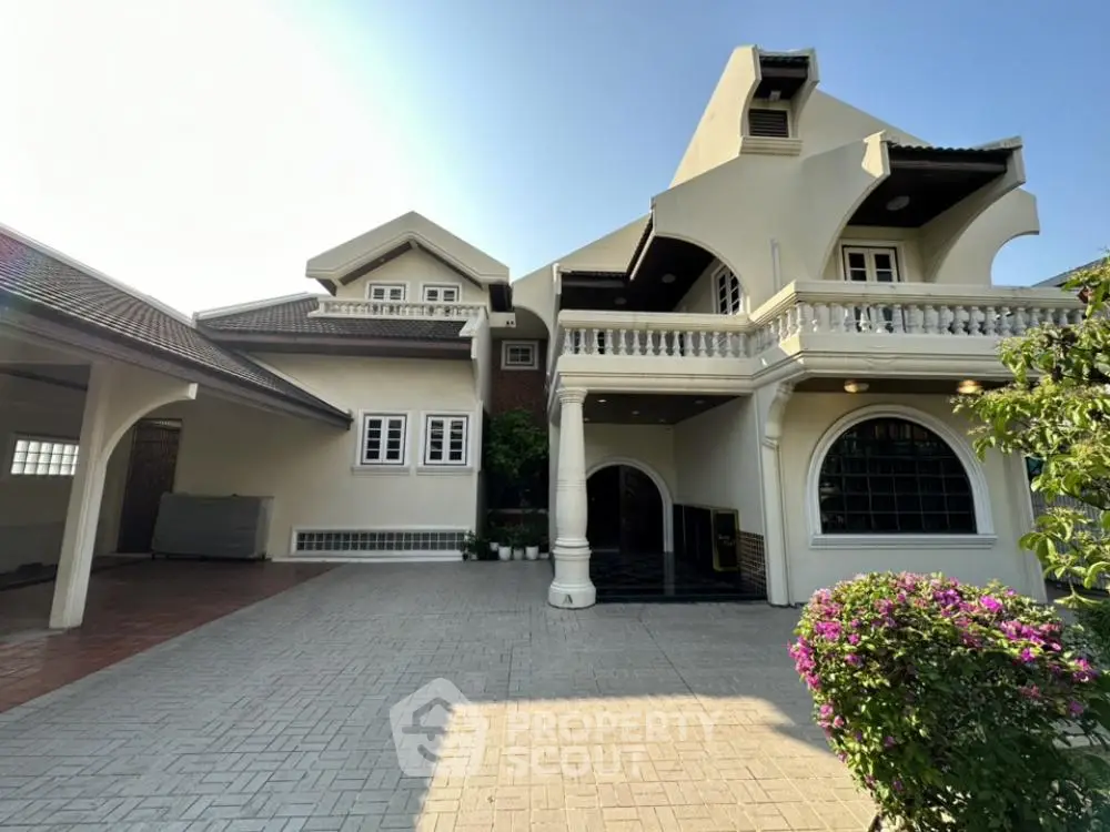 Stunning two-story house with elegant architecture and spacious driveway