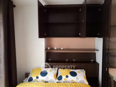 Cozy bedroom with modern storage cabinets and stylish bedding