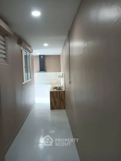 Compact kitchen with minimalist design and sleek finishes