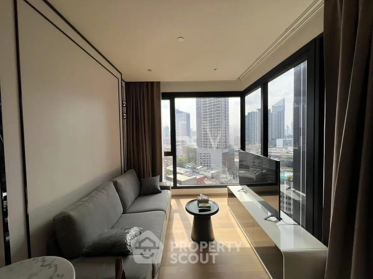 Modern living room with panoramic city view and sleek furnishings