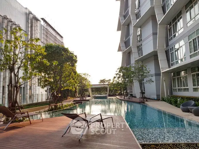 Luxurious apartment complex with stunning pool and modern architecture
