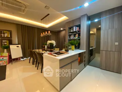 Modern dining area with elegant lighting and sleek cabinetry in a luxury apartment