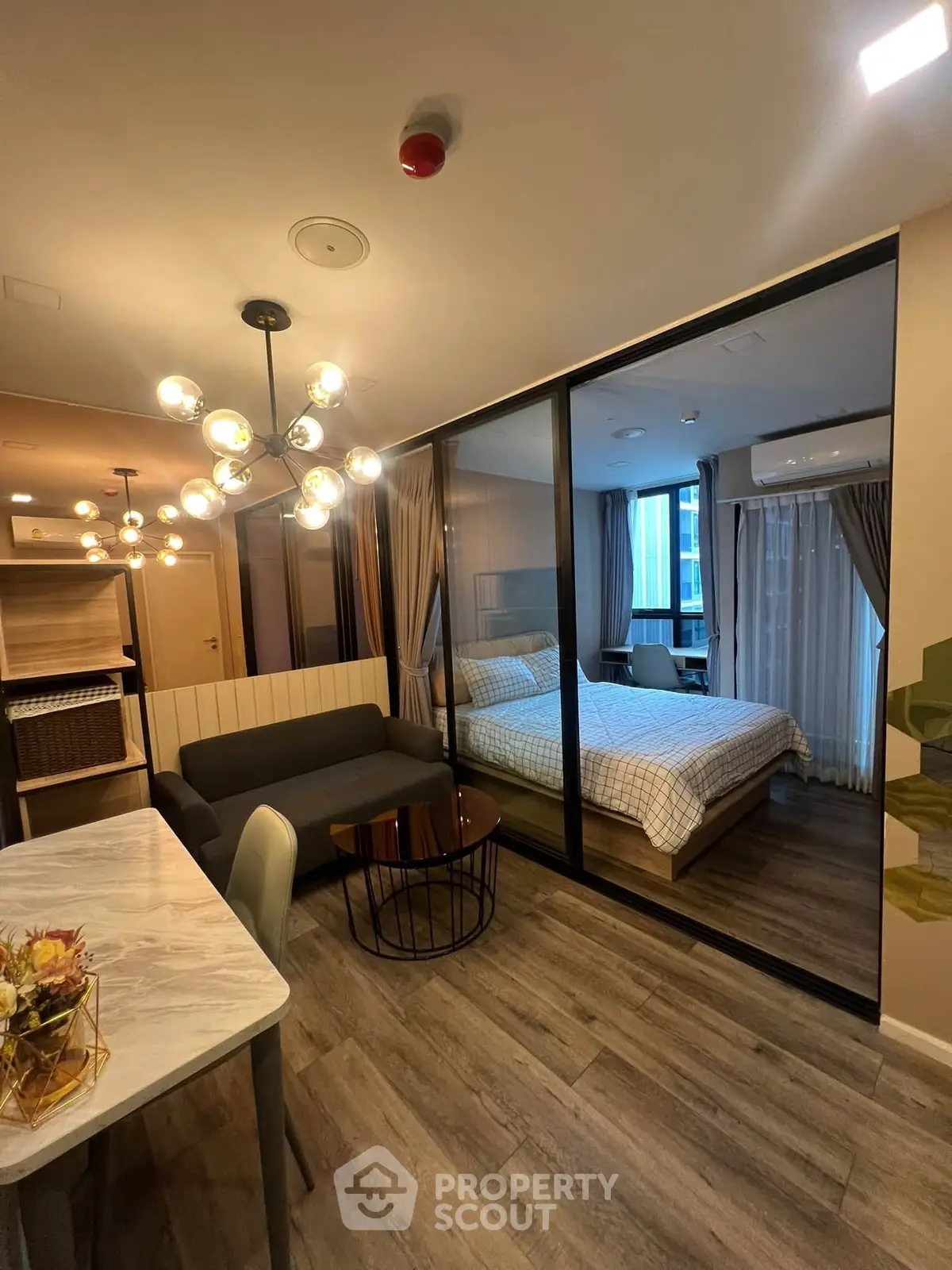 Modern apartment interior with stylish living room and cozy bedroom