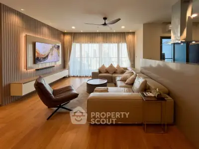 Luxurious living room with modern decor, spacious seating, and large windows offering city views.