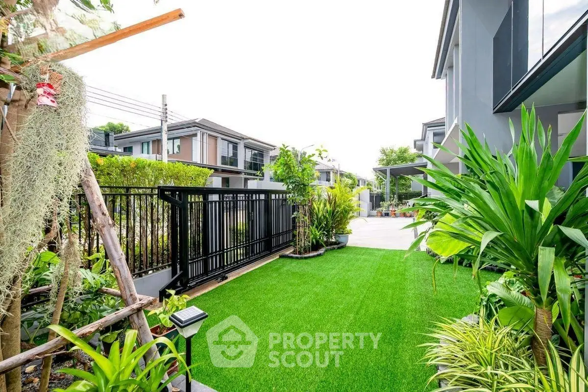 Beautiful garden with lush greenery and modern home exterior