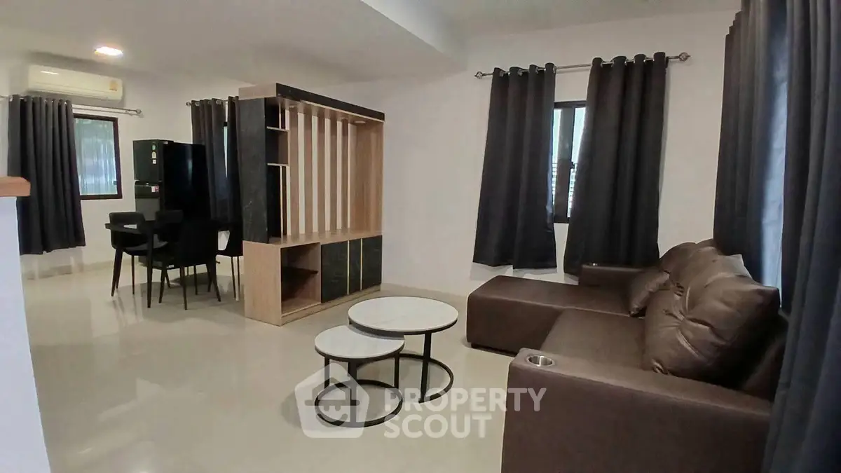 Modern living room with stylish furniture and open layout in a contemporary apartment.