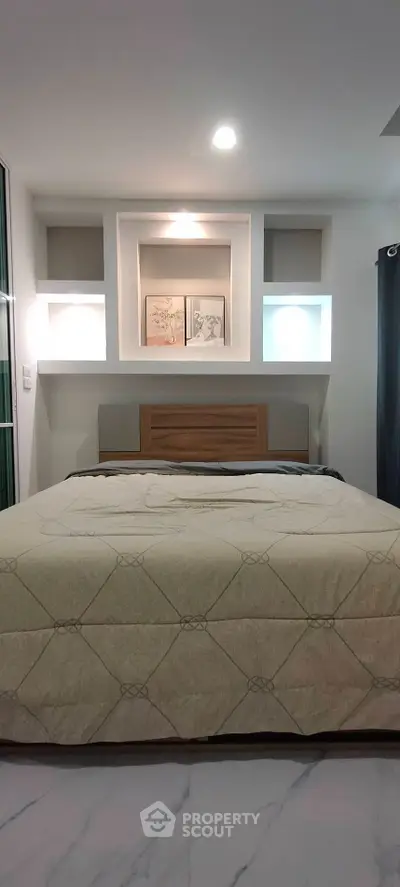 Modern bedroom with stylish decor and cozy ambiance