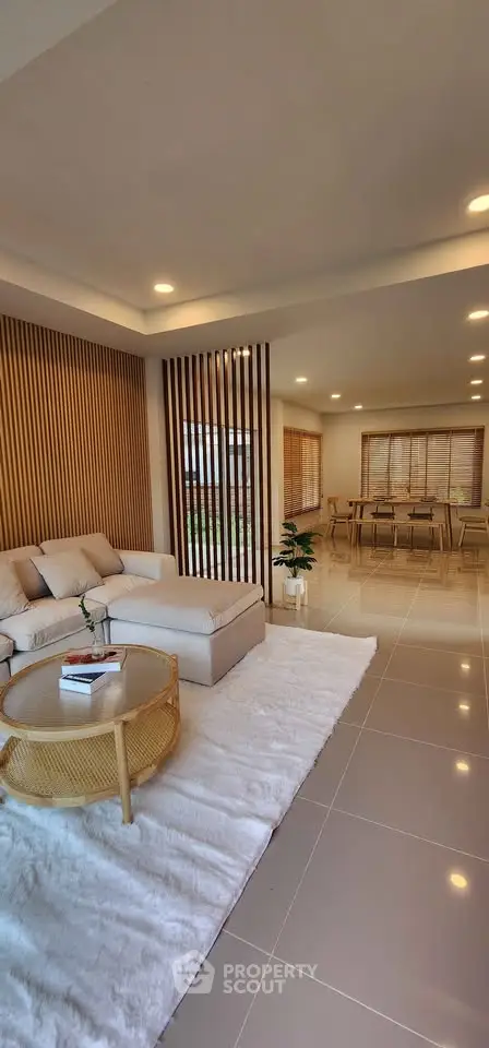Spacious modern living room with elegant decor and open layout