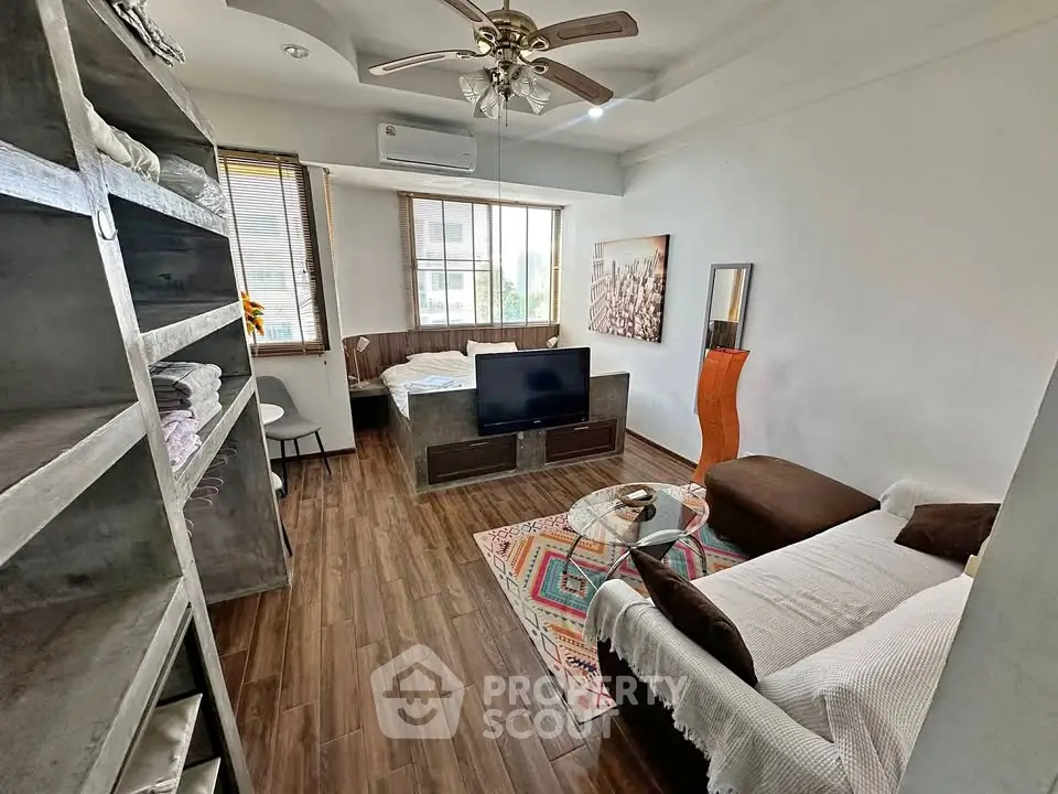 Charming studio apartment with cozy living area and modern decor