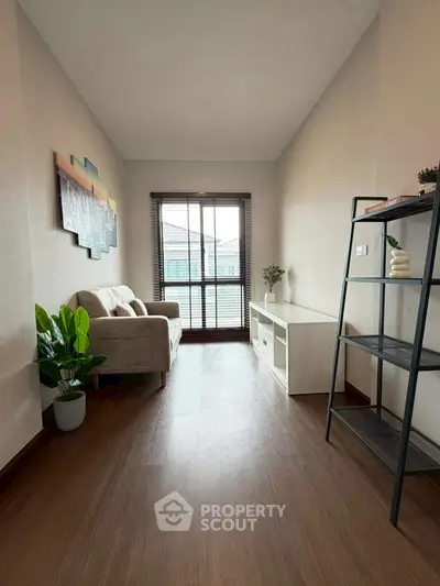 Cozy living room with modern decor and natural light