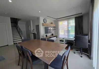 Spacious dining area with modern decor and natural light
