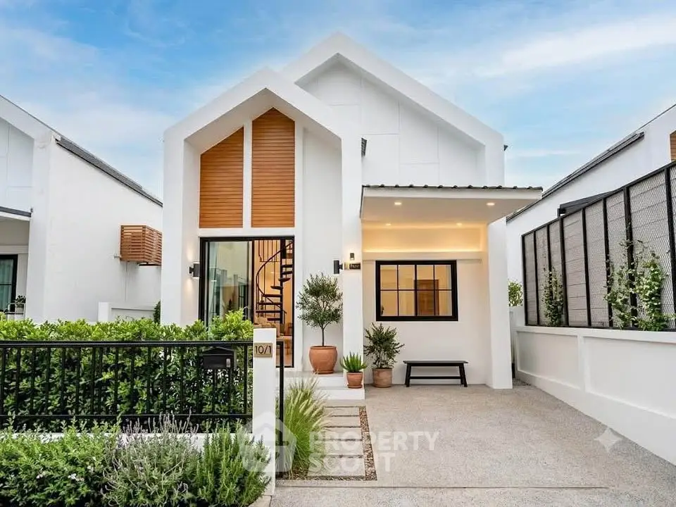 Charming modern house with lush garden and stylish facade