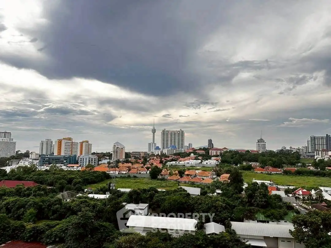 Stunning cityscape view with lush greenery and skyline, perfect for urban living enthusiasts.
