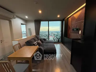 Modern living room with panoramic city view and stylish decor