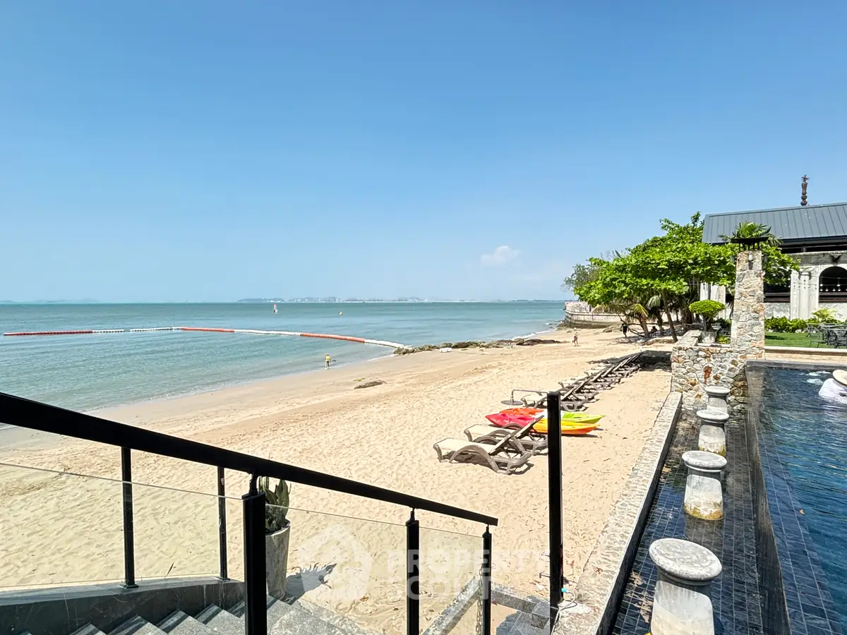 Stunning beachfront property with pool and ocean view, perfect for luxury living.