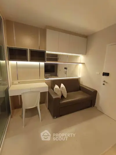 Modern living room with sleek furniture and built-in storage solutions