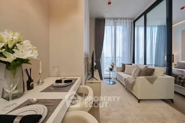 Luxurious modern living room with elegant decor and large windows