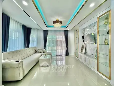 Luxurious living room with elegant chandelier and modern decor