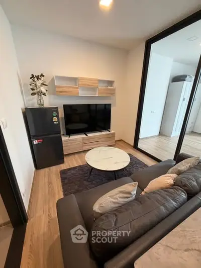 Modern living room with sleek furniture and stylish decor