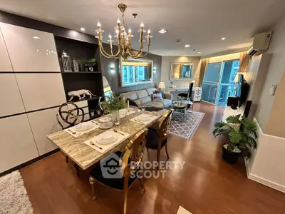 Luxurious open-plan living room with elegant dining area and modern decor