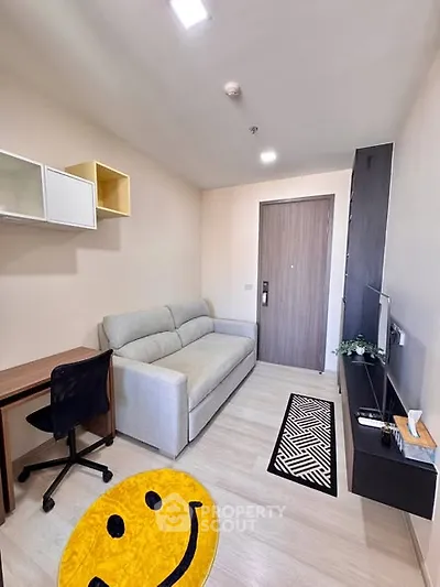 Modern living room with cozy sofa and stylish decor
